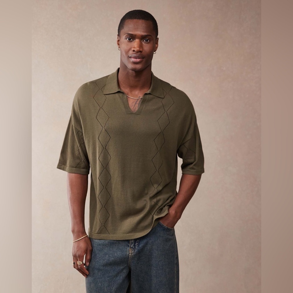 ASOS DESIGN relaxed knit notch neck polo shirt with pointelle pattern